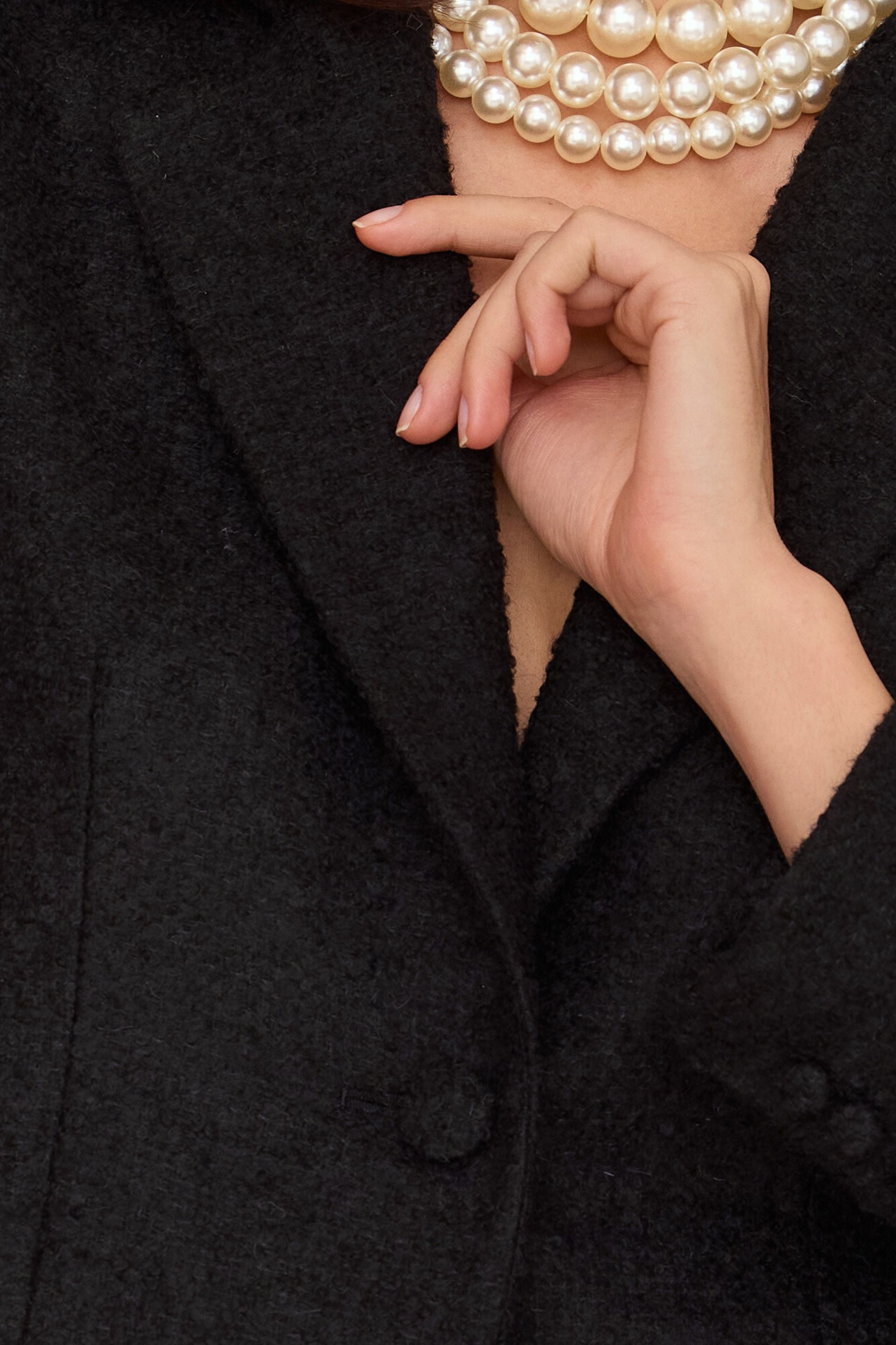 Krótka wełniana marynarka boucle