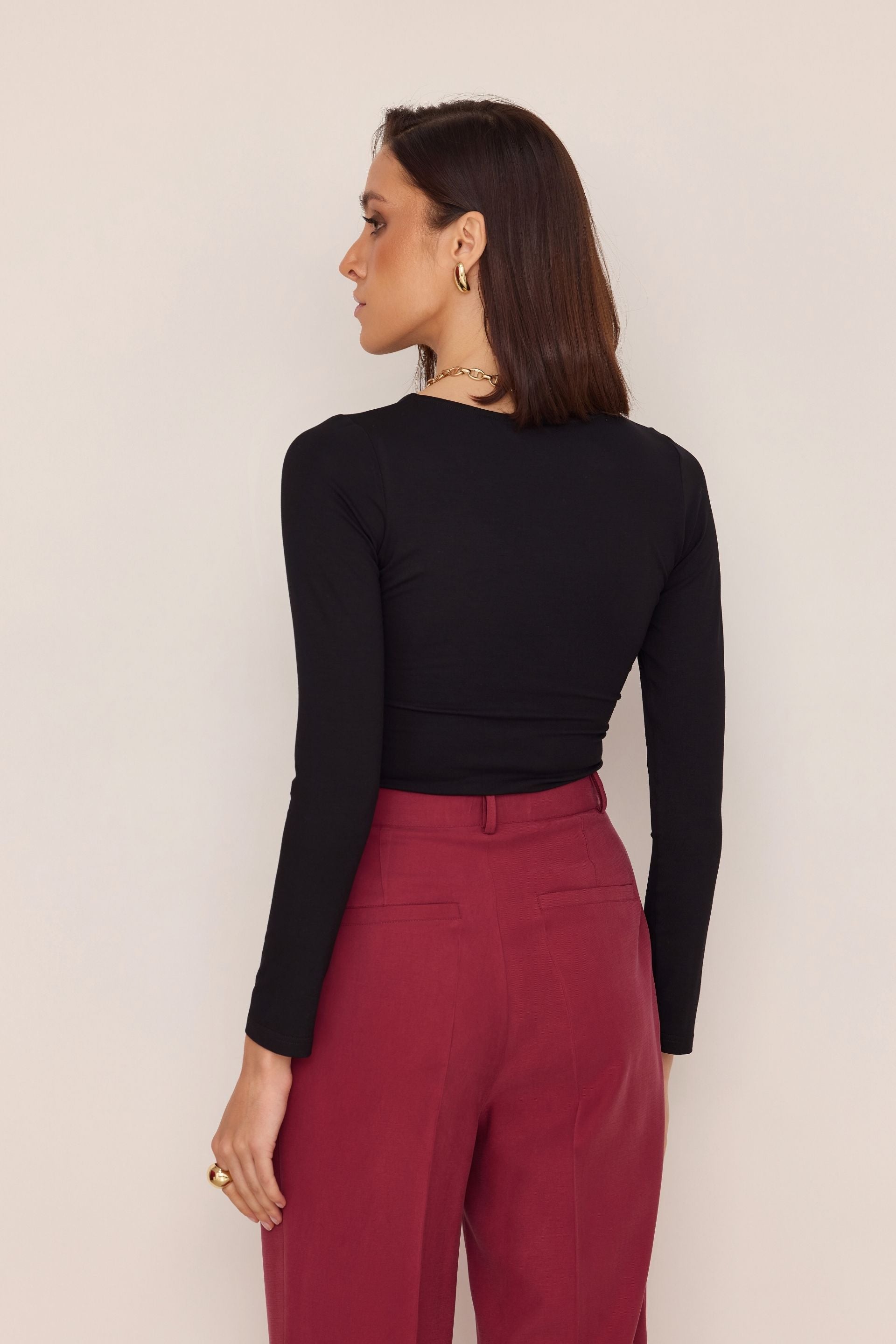 Black blouse with draped sides