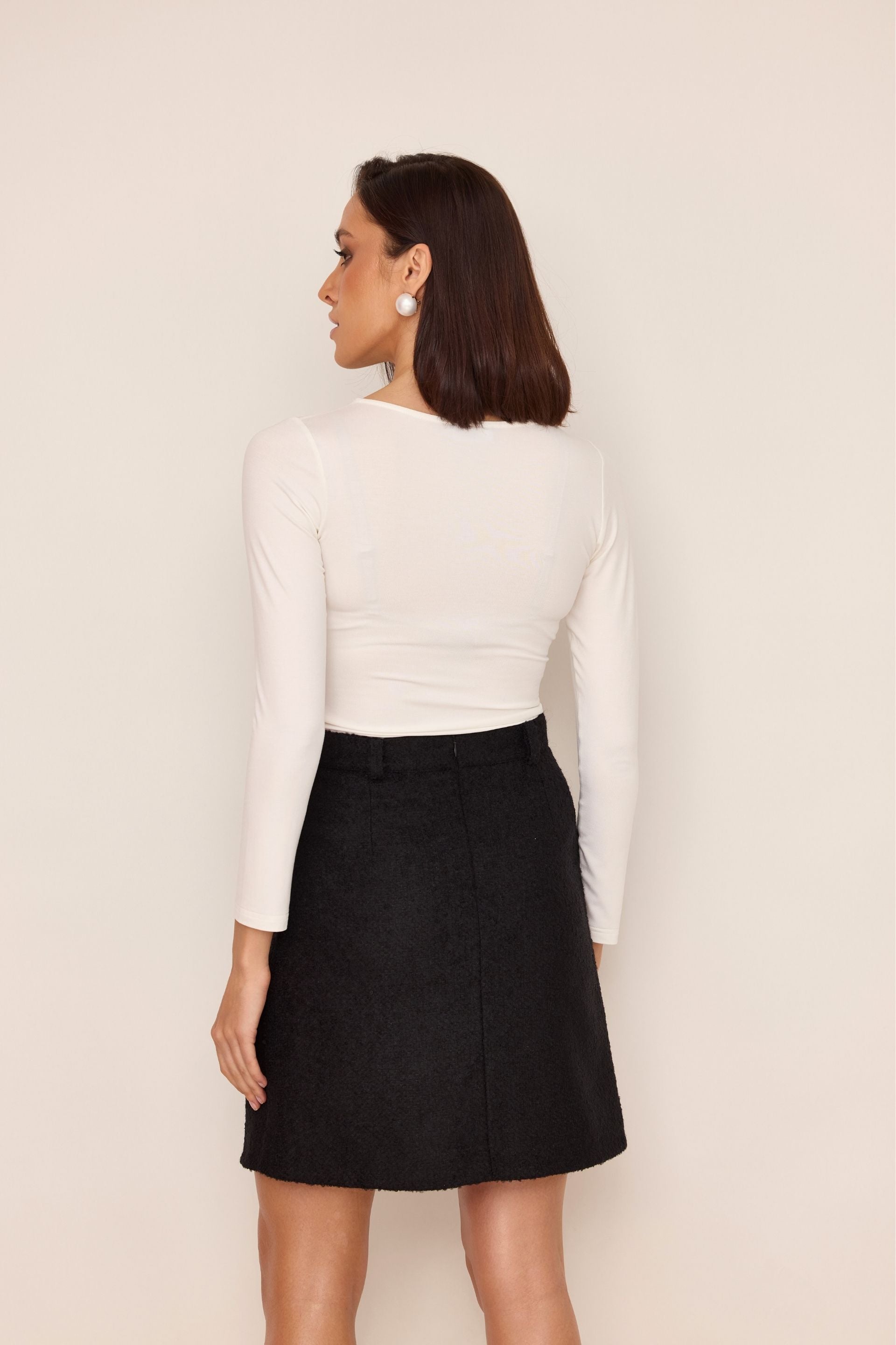 Creamy white blouse with draped sides