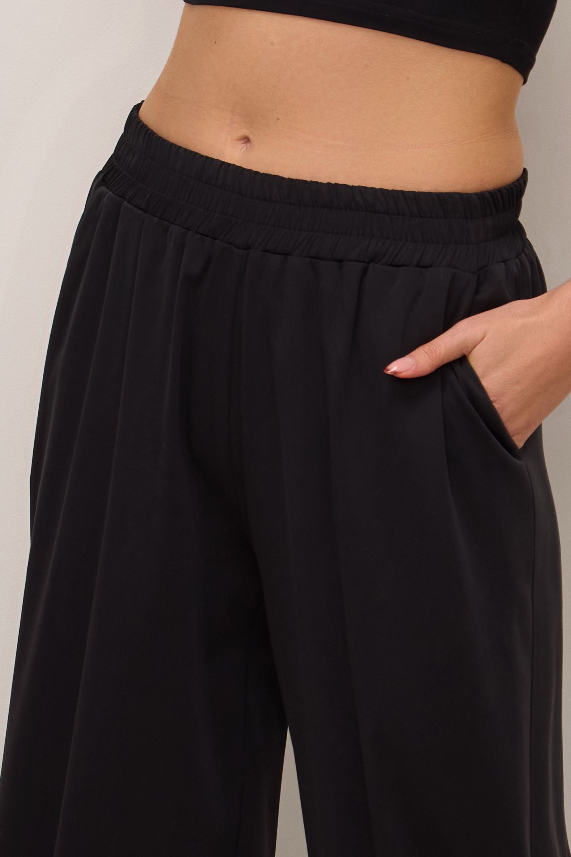 Wide leg trousers with elastic waistband, dusty black