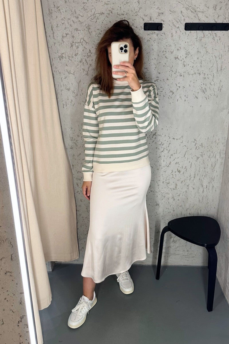 Off-white striped sweatshirt with pistachio