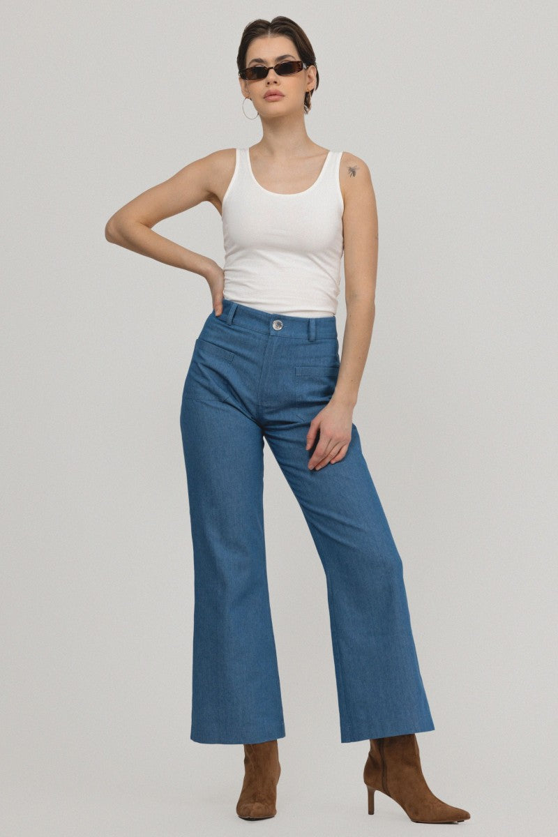 Navy blue denim trousers with patch pockets
