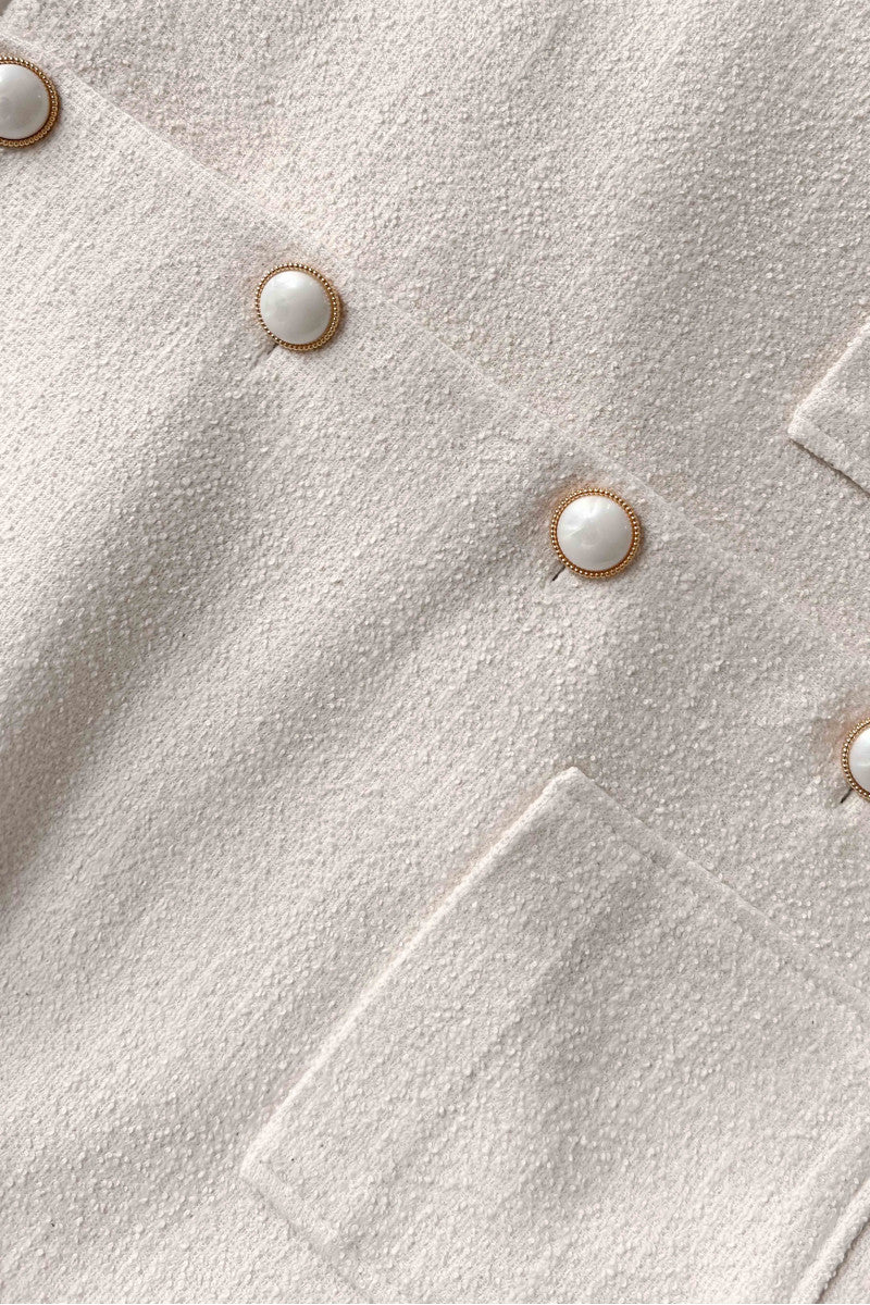 Short cream bouclé jacket