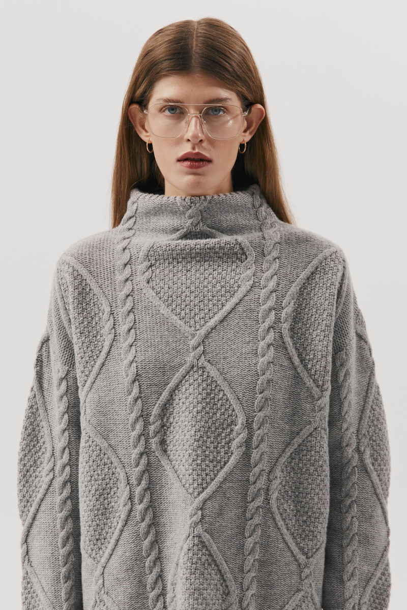Gray cable-knit wool sweater