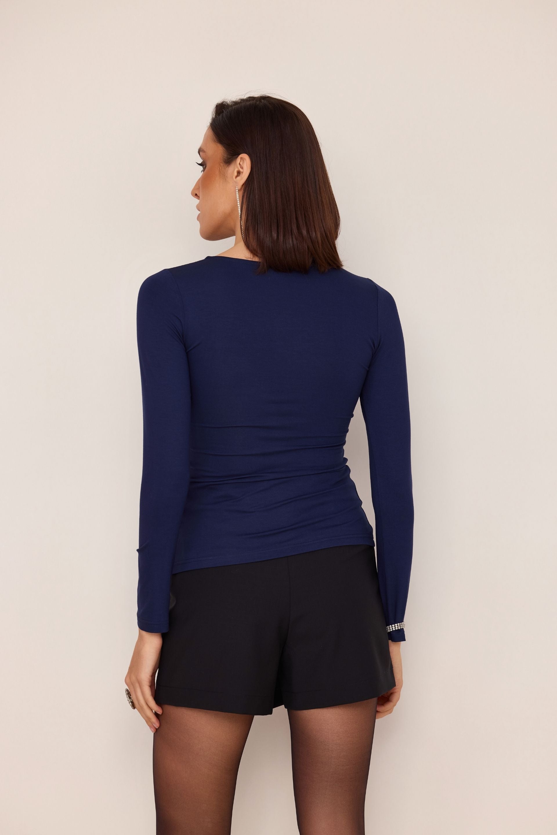 Navy blue blouse with draped sides