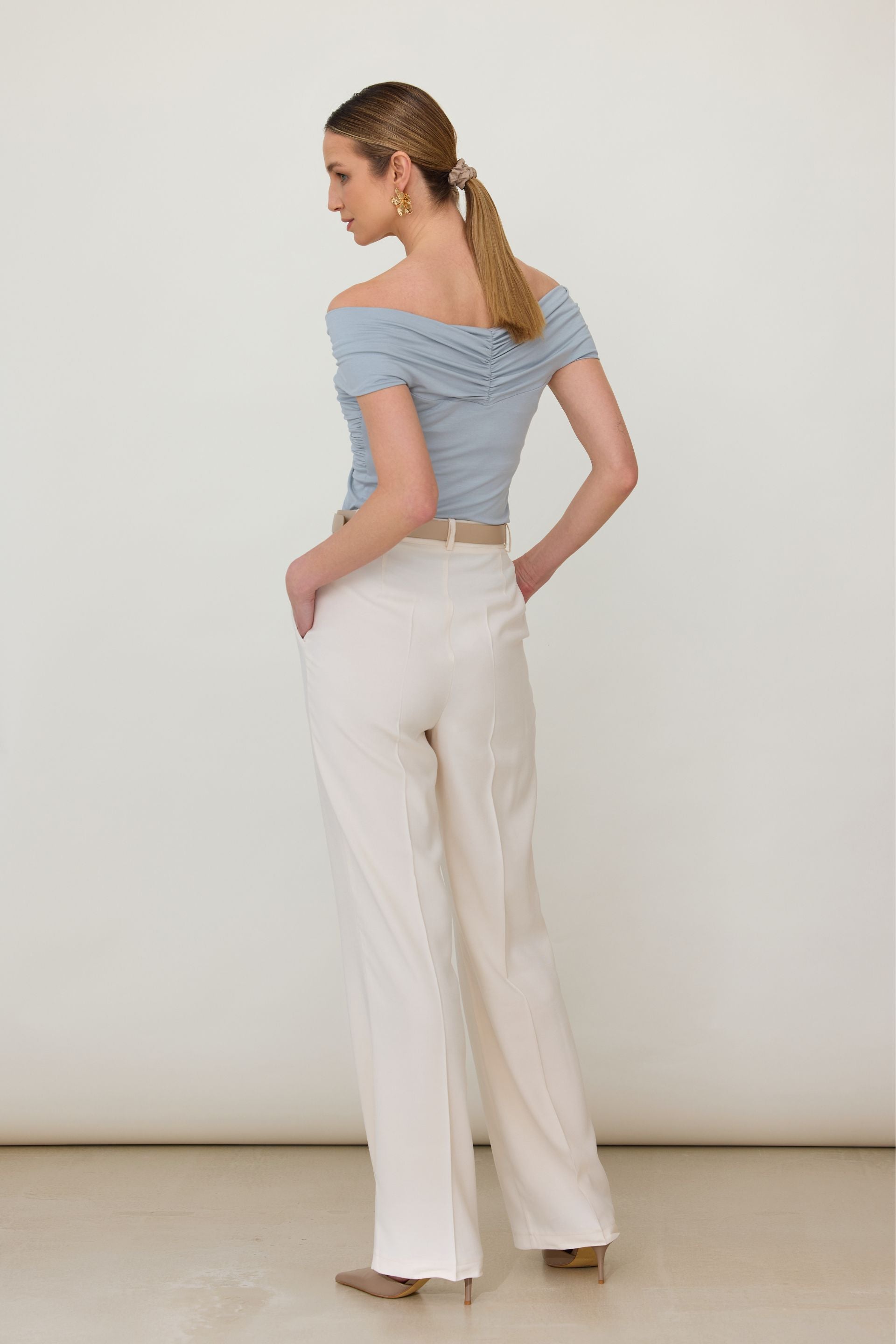 Red off-the-shoulder blouse with a roll-up
