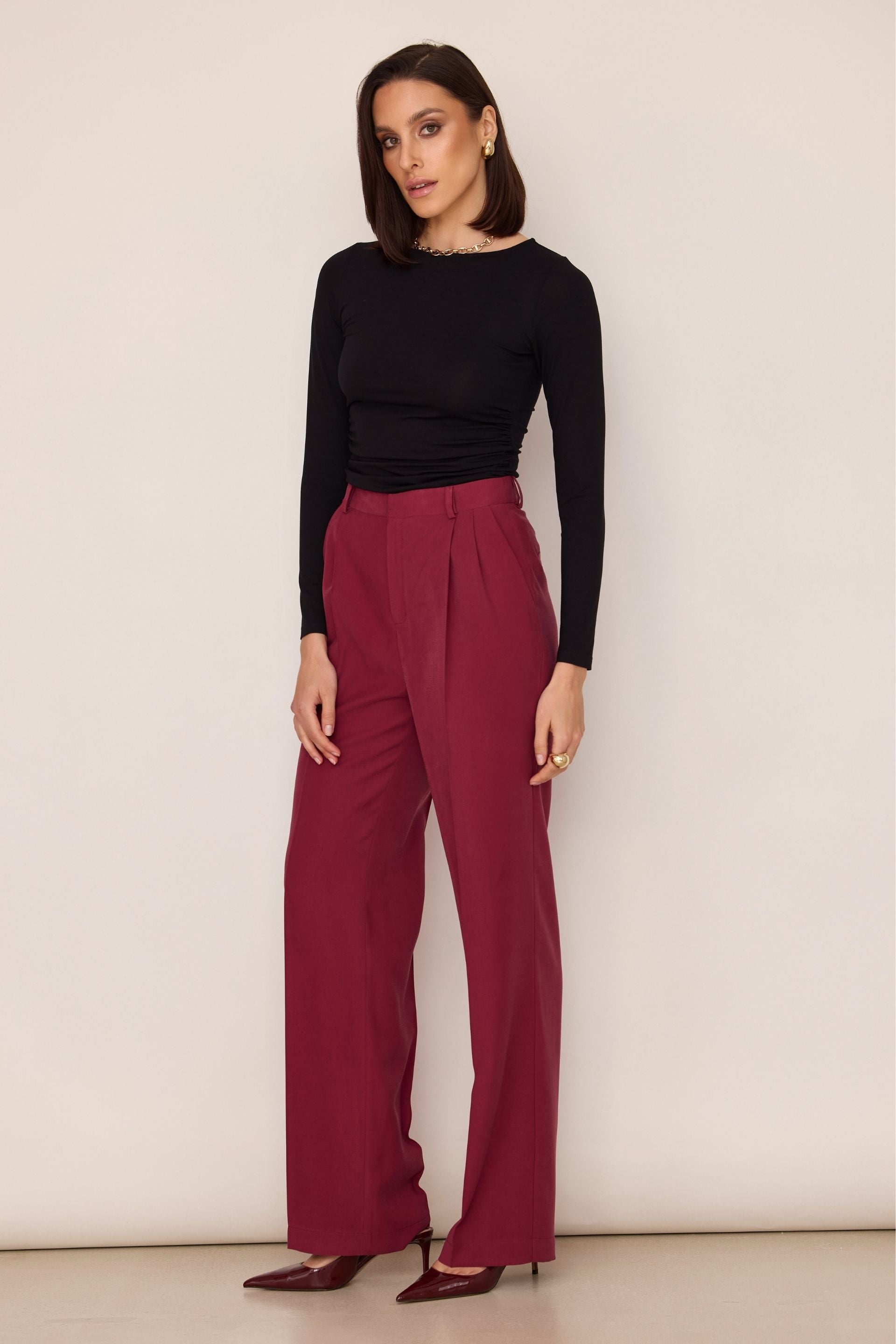 Black blouse with draped sides