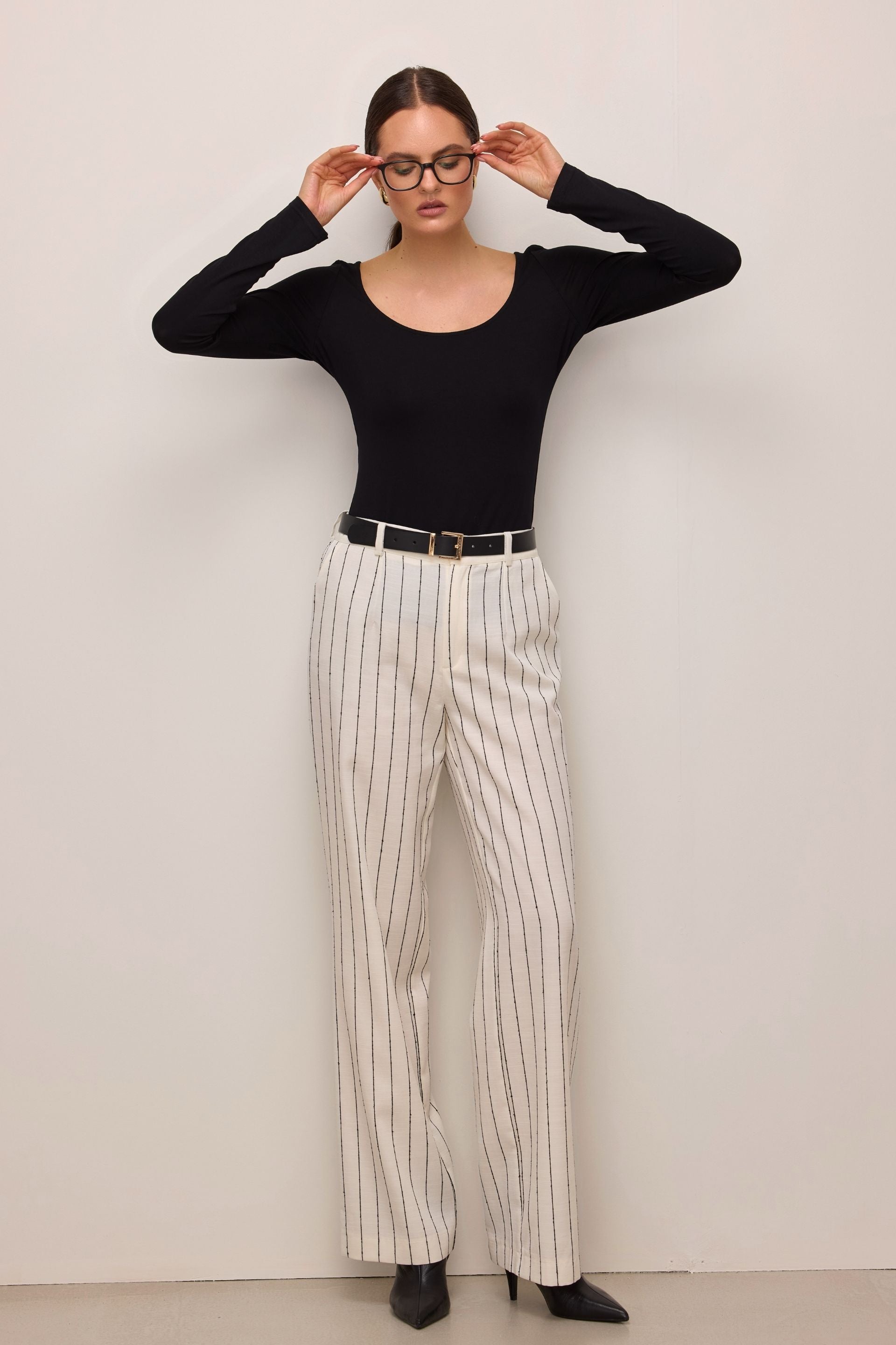 Black blouse with a large round neckline