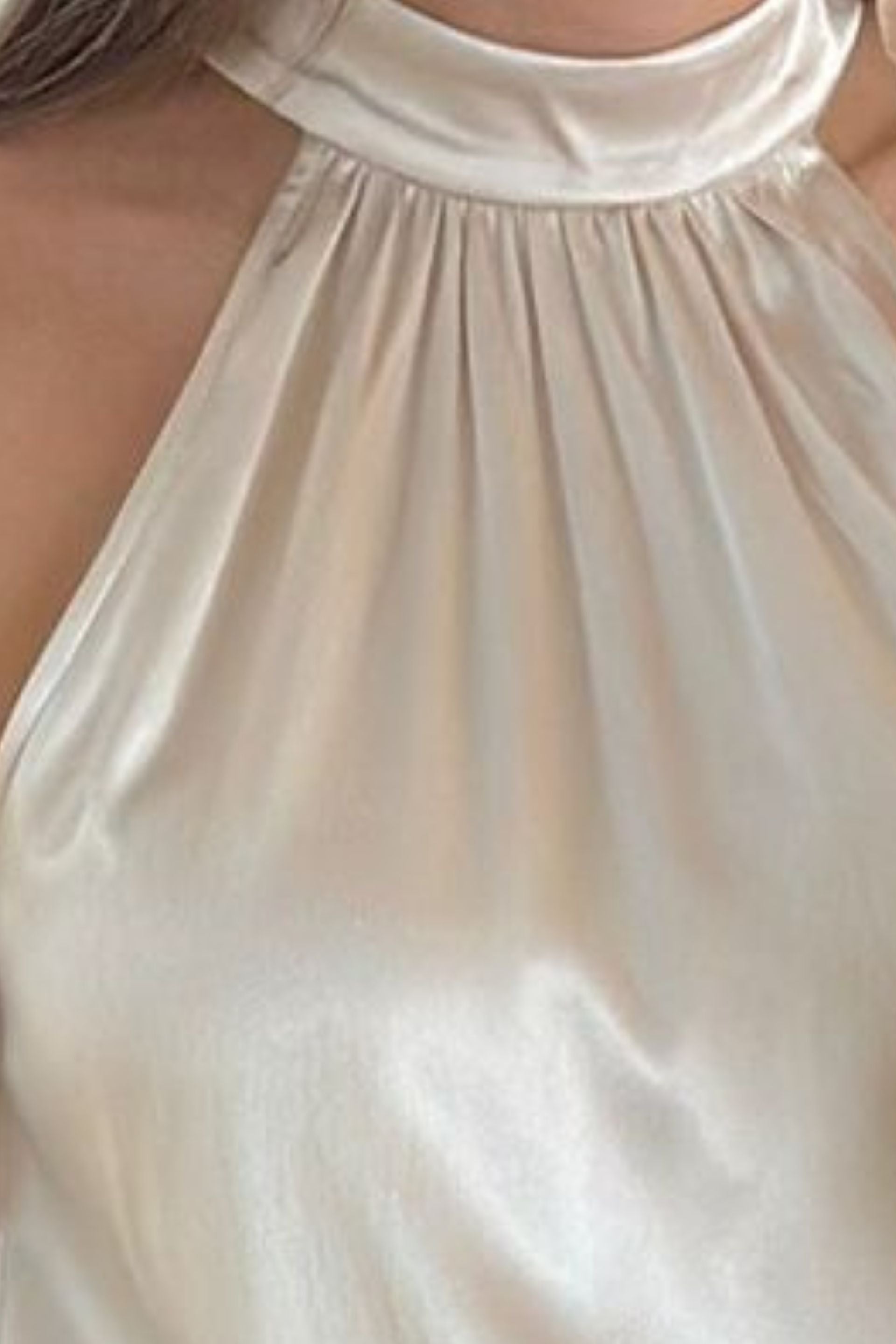 Elegancki top z dekoltem halter złota perła