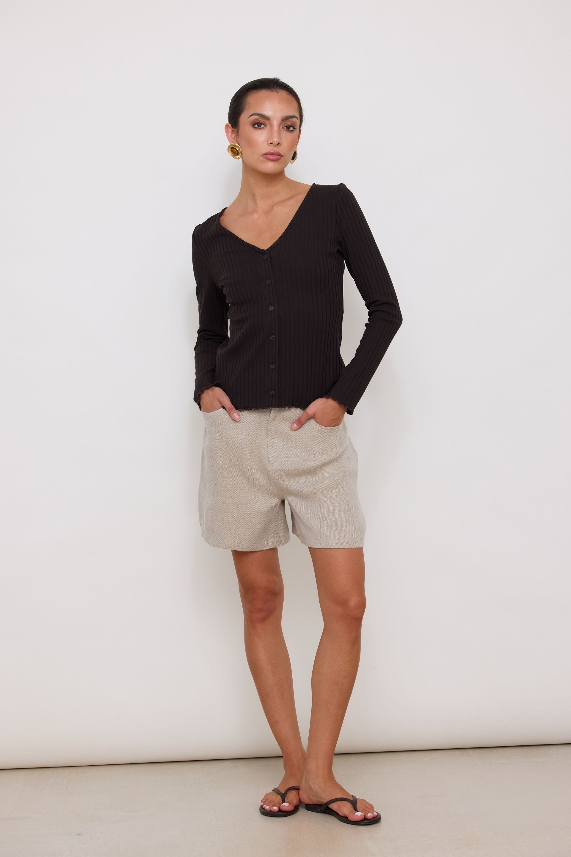 Cream V-neck button-down blouse