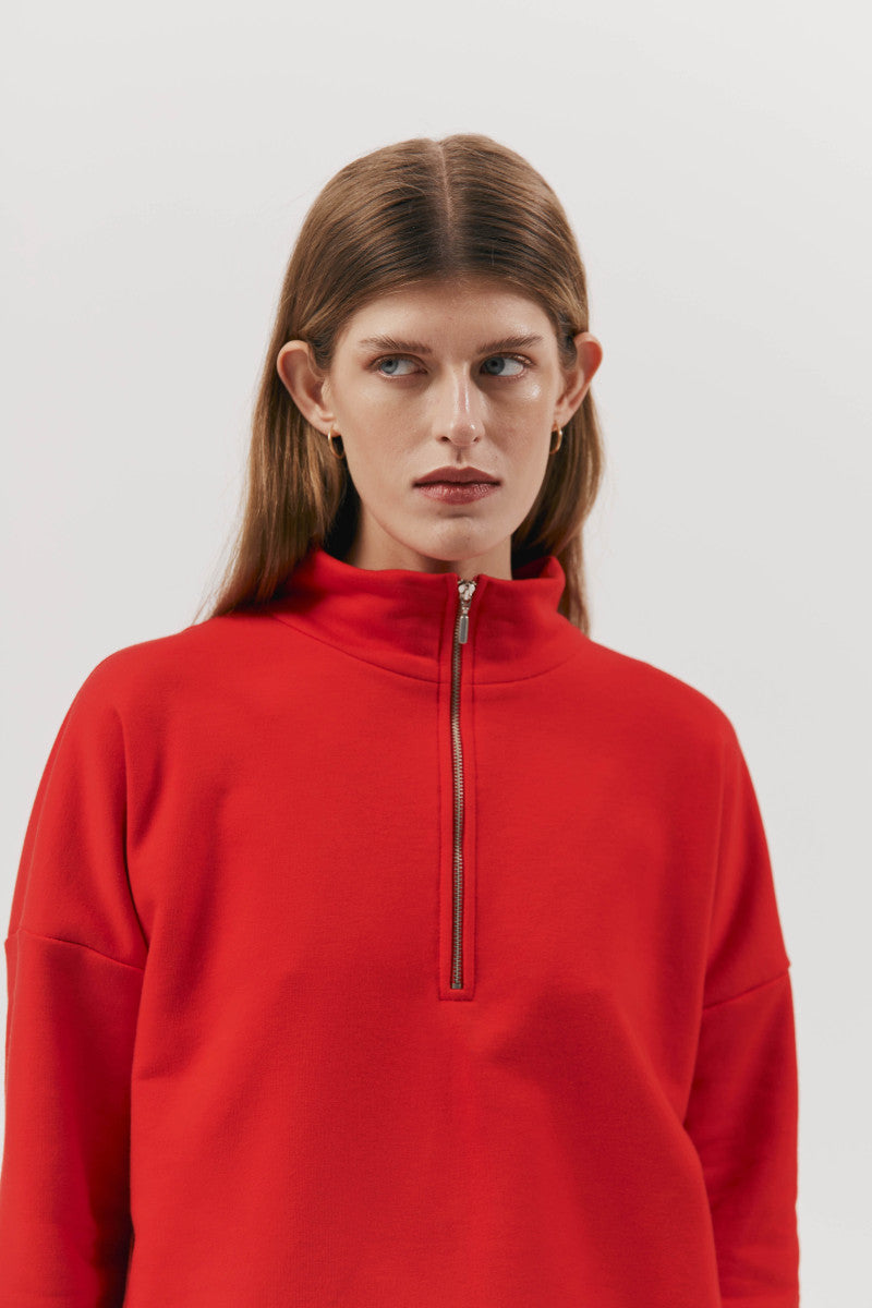 Red zip-up sweatshirt