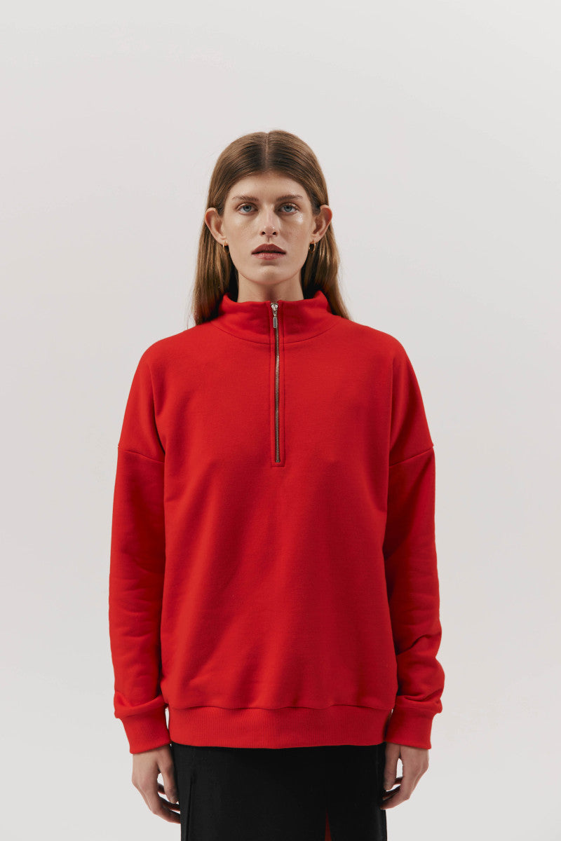 Red zip-up sweatshirt