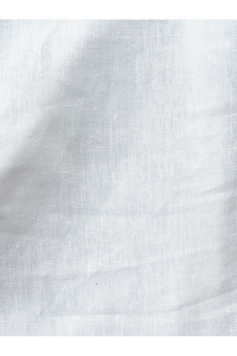 Loose-fitting white linen shirt