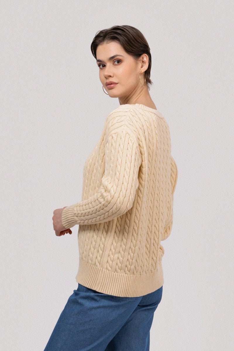 Pastel yellow cable-knit sweater